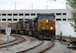 CSX 212 leads train F741-25 out of the yard